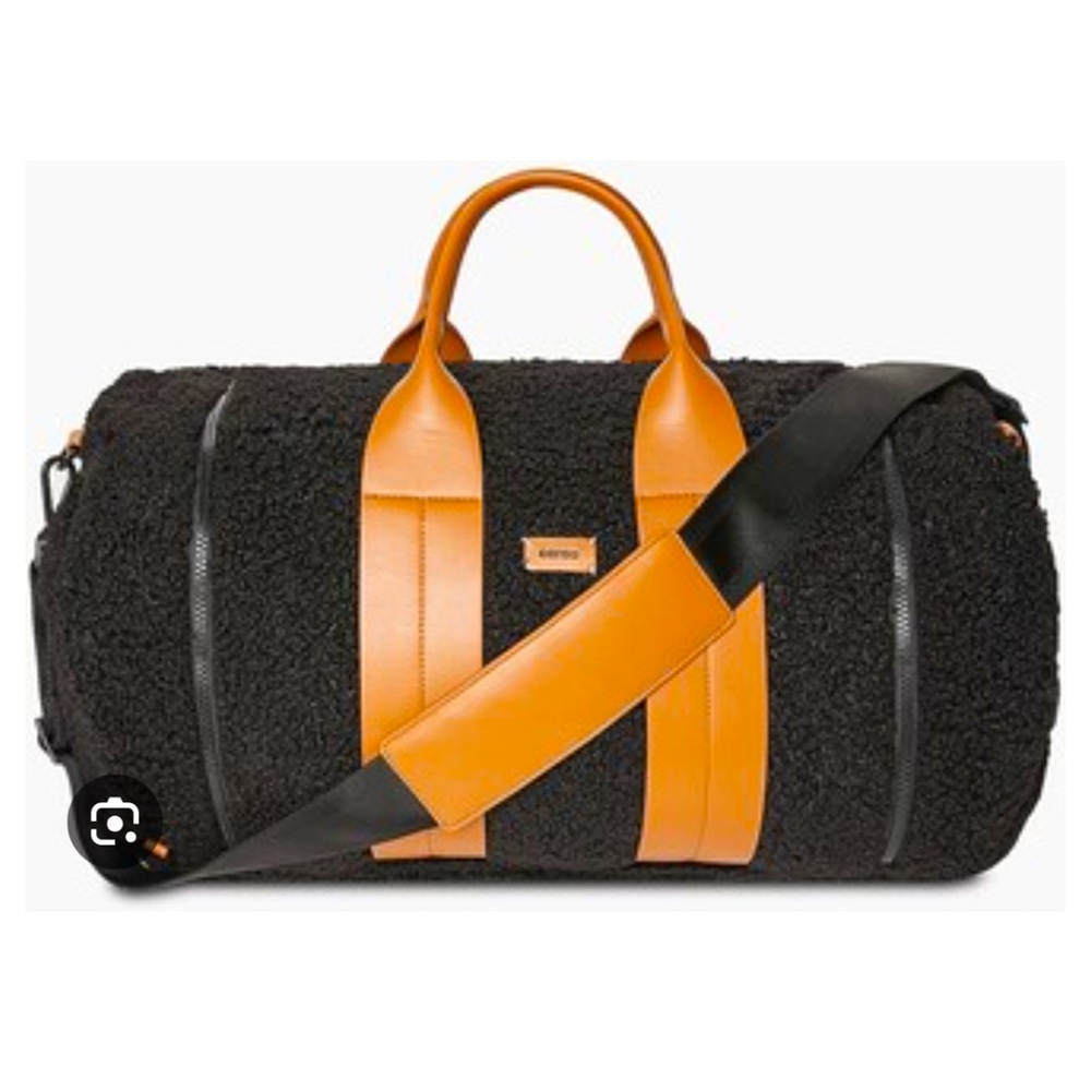 Gorgeous like new black Caraa Sherpa Duffle